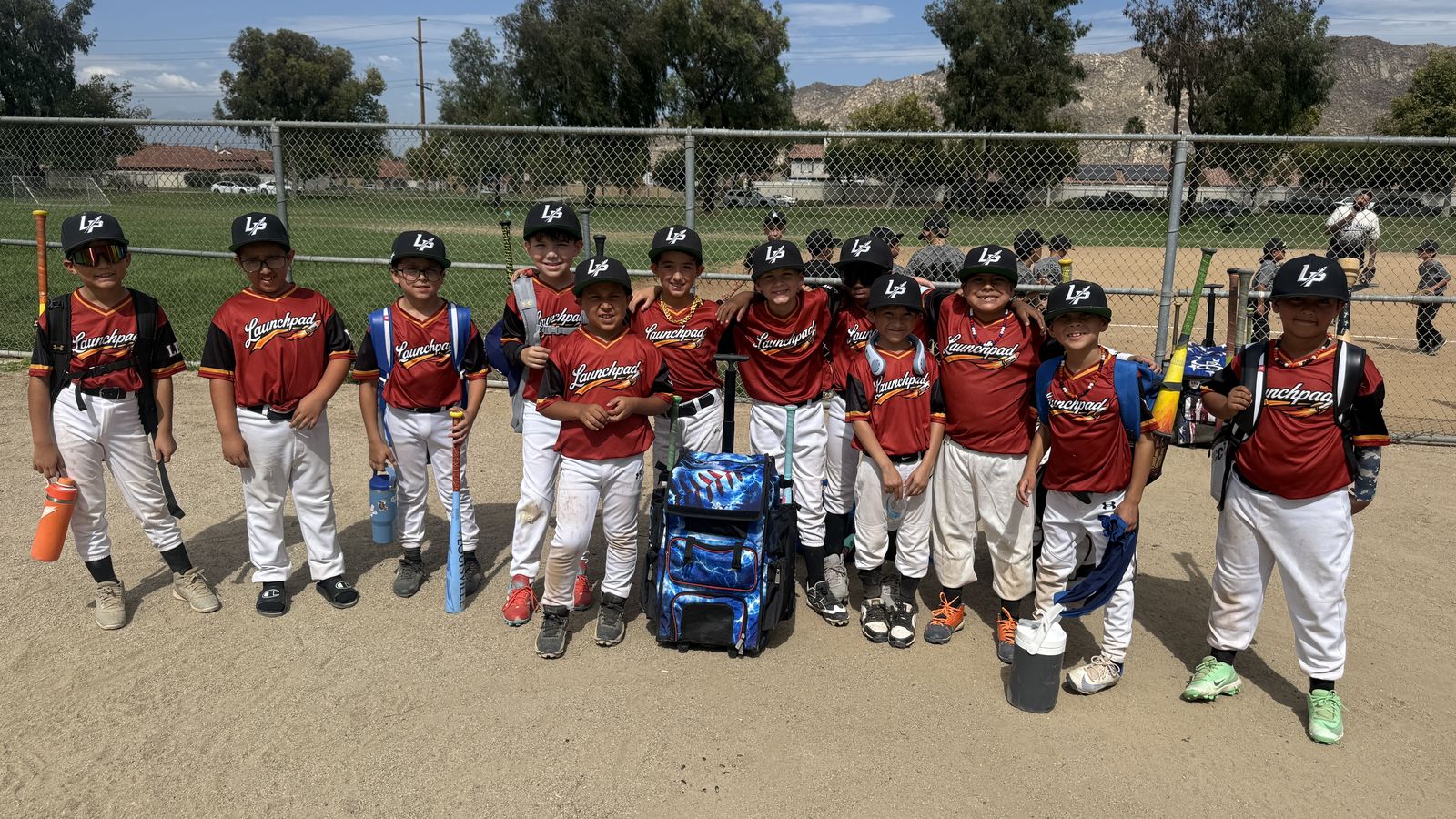 Launchpad Baseball Academy players in team jerseys at the field